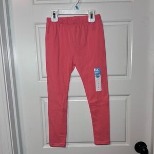 Lightning bug leggings, peach in color, girl size 6